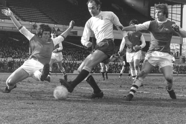 Alan Gilzean in the thick of the action during a North London derby against Arsenal in 1970.  Picture: Douglas Miller/Keystone/Getty Images