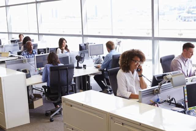 Male and female office staff can still be paid at different rates for performing the same work. Picture: Monkey Business Images