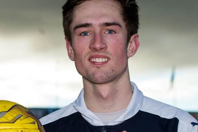 Raith's Ryan Hardie celebrates his hat-trick with the match ball at full time. Picture: SNS
