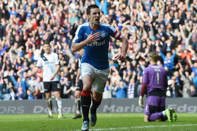 Joy for Rangers captain Lee Wallace after he made it 4-0 against Dundee. Picture: SNS