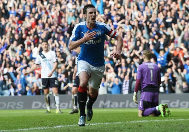 Joy for Rangers captain Lee Wallace after he made it 4-0 against Dundee. Picture: SNS