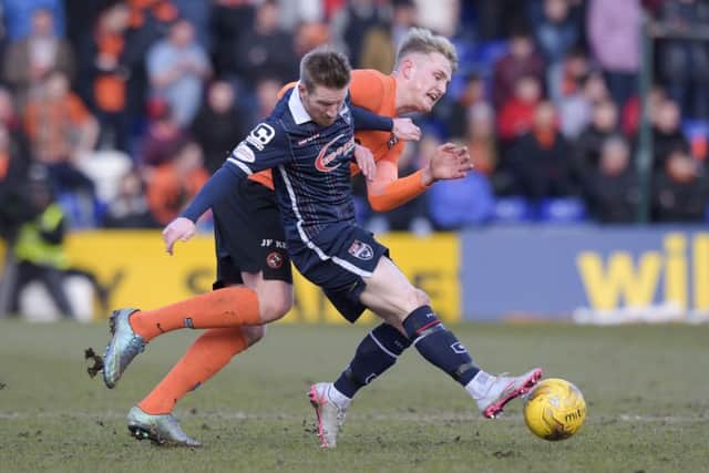 Michael Gardyne and Dundee Utd's Coll Donaldson pictured during the Scottish Cup quarter final. Picture: SNS
