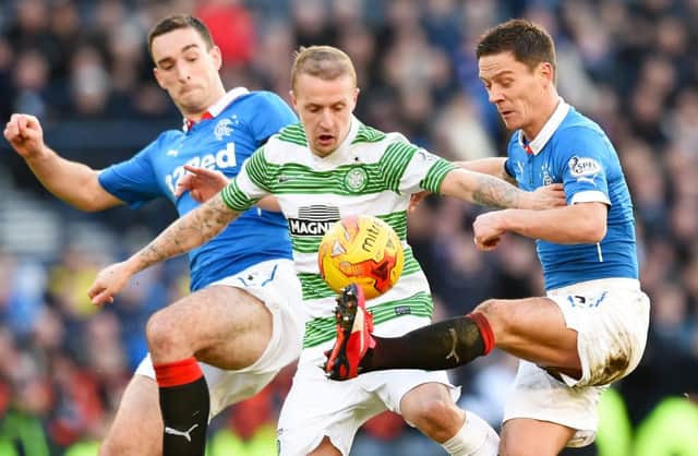 Celtic's Leigh Griffiths, centre, battles with Ian Black, right, and Lee Wallace of Rangers during last season's Old Firm League Cup semi-final. Picture: Craig Williamson/SNS