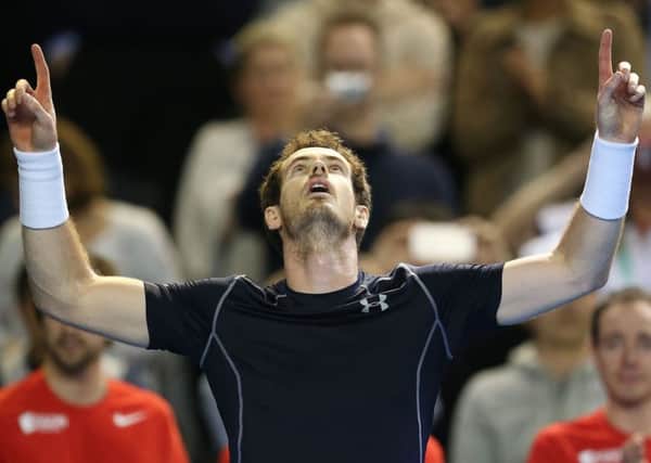 Andy Murray reacts after winning his singles match against Japan's Kei Nishikori in the Davis Cup. Picture: AFP/Getty Images