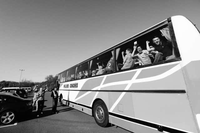 Rovers fans celebrate as they leave Broadwood Stadium in Cumbernauld following a 3-2 win over Clyde in April 2015. The result secured the League Two title for their side. Picture: Iain McLean