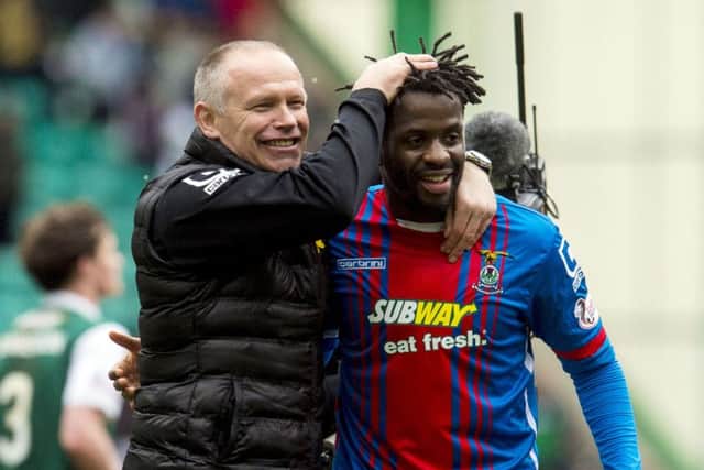 John Hughes with goalscorer Andrea Mbuyi-Mutombo. Picture: SNS