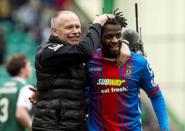 John Hughes with goalscorer Andrea Mbuyi-Mutombo. Picture: SNS