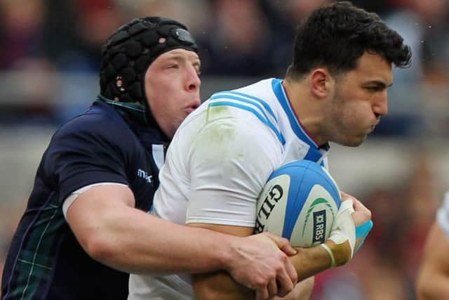 New Glasgow signing Leonardo Sarto, right, played against Scotland last month