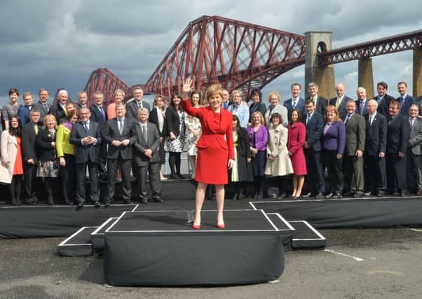 First Minister Nicola Sturgeon with SNP MPs at the Forth Bridge at South Queensferry
