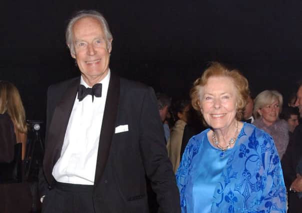Sir George Martin, the producer known as the 'Fifth Beatle', has died aged 90. He is pictured here with his wife Judy in 2002. Image: Yui Mok/PA Wire