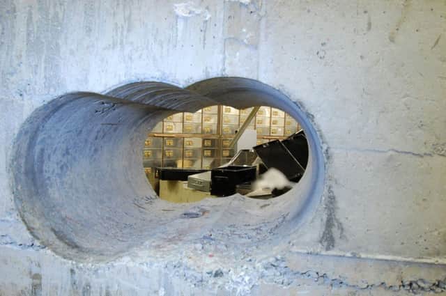 Tunnel leading into the vault at the Hatton Garden Safe Deposit company in London. Picture: PA