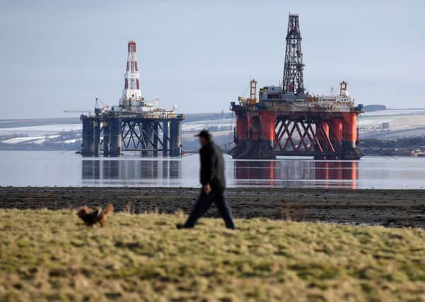 A global crash in oil prices has seen revenues from the North Sea, and Scotlands share, plummet in value by 55 per cent in a year. Picture: PA