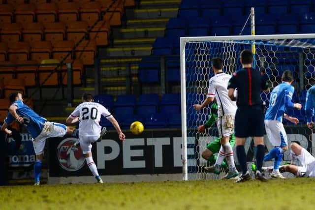 St Johnstones Chris Kane knocks the ball home at the far post to give the home side all three points at McDiarmid Park last night. Picture: SNS
