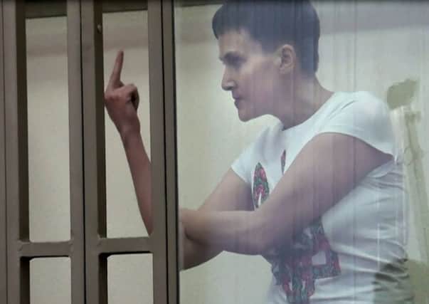 Nadezhda Savchenko defiant in the dock in Donetsk. Picture: AFP/Getty Images