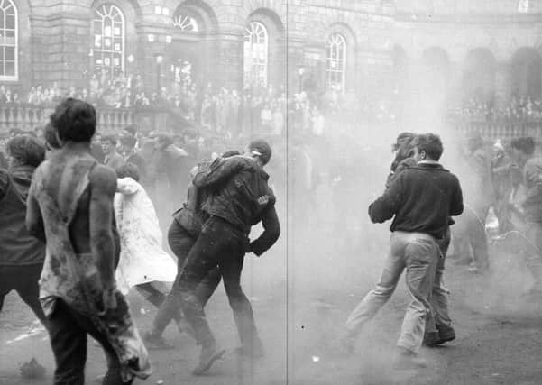 Students take part in a rectorial battle in a haze of smoke (?) at the Old Quad of Edinburgh University, November 1963.