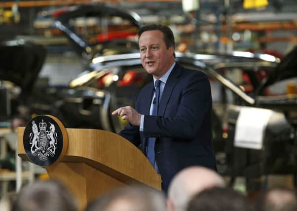 Prime Minister David Cameron spoke about the benefits of EU membership on a visit to Vauxhalls Ellesmere Port plant. Picture: PA