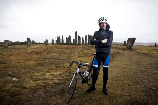 Mark Beaumont with famous Callanish Stones in the background