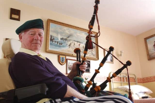 Piper Bill Millin at his home in Dawlish, Devon Picture: Barry Batchelor/ PA