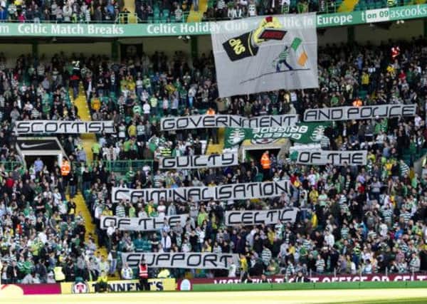 Celtic fans protest against the legislation. Picture: SNS