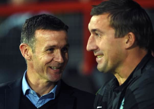 Jim McIntyre and Alan Stubbs will see their sides go head-to-head on Sunday. Picture: SNS