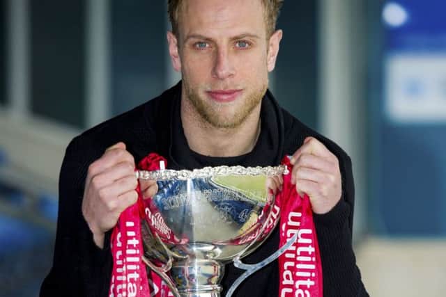 Ross County skipper Andrew Davies hopes he will be lifting the League Cup at Hampden tomorrow. Picture: SNS Group
