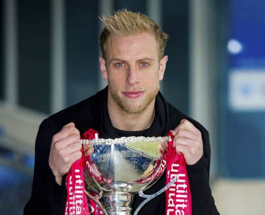 Ross County skipper Andrew Davies hopes he will be lifting the League Cup at Hampden tomorrow. Picture: SNS Group
