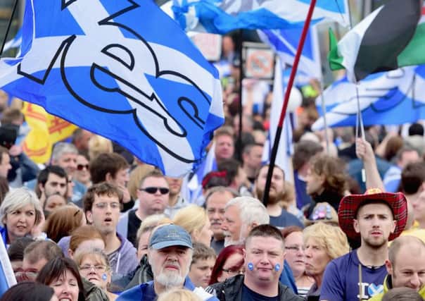 Pro-independence supporters march through Glasgow en route to BBC Scotland, where they staged a protest against perceived media bias. Picture: Jeff J Mitchell/Getty