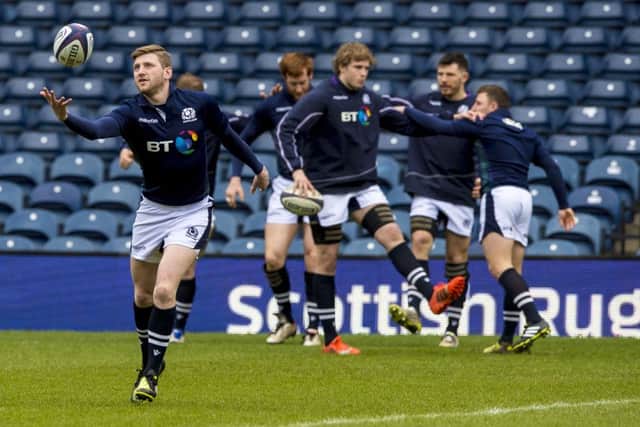 Russell up a win: Scotland stand-off Finn Russell juggles during training on the Murrayfield pitch yesterday.
Photograph: Gary Hutchison/SNS
