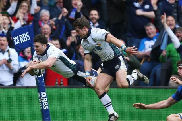 Duncan Taylor of Scotland dives over to score his team's second try. Picture: Getty