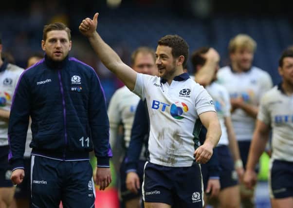 Greig Laidlaw celebrates as he does his lap of honour after the match but how did he rate? Picture: Getty