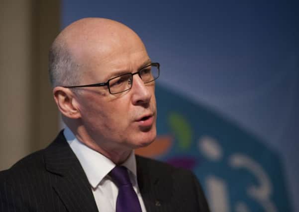 Deputy First Minister John Swinney has called for an end to stringent austerity measures put in place by George Osborne. Image: Andrew O'Brien