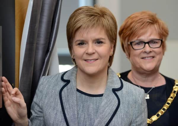 First Minister Nicola Sturgeon with her mother Provost Joan Sturgeon at the reopening of Saltcoats Town Hall today. Picture: Hemedia