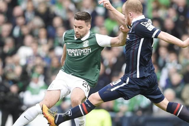 McGregor, left, a Hibs fan, took Sunday's loss as hard as anyone. Picture: Greg Macvean