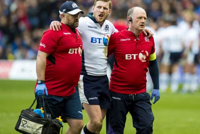 Finn Russell was forced off through injury against France. Picture: SNS