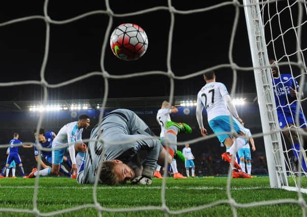 Newcastle goalkeeper Rob Elliot looks back to see Shinji Okazaki's shot hit the net. Picture: Getty