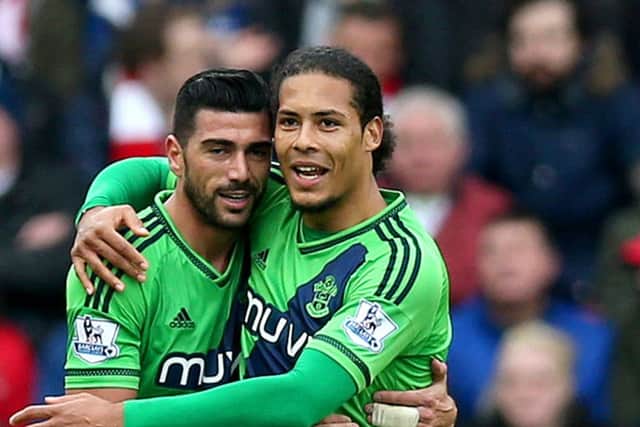 Virgil van Dijk celebrates with team-mate Graziano Pelle during Southampton's match with Stoke on Saturday. Picture: Getty