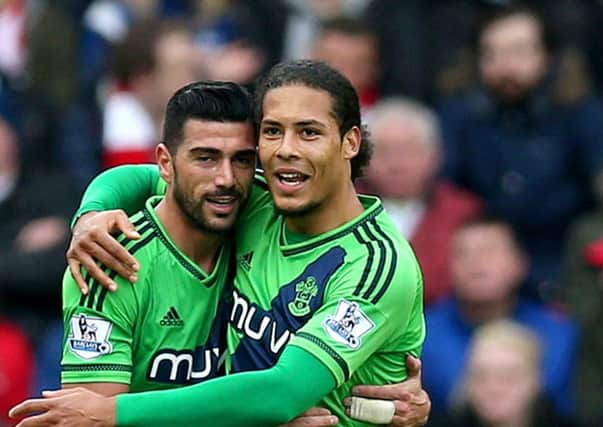 Virgil van Dijk celebrates with team-mate Graziano Pelle during Southampton's match with Stoke on Saturday. Picture: Getty