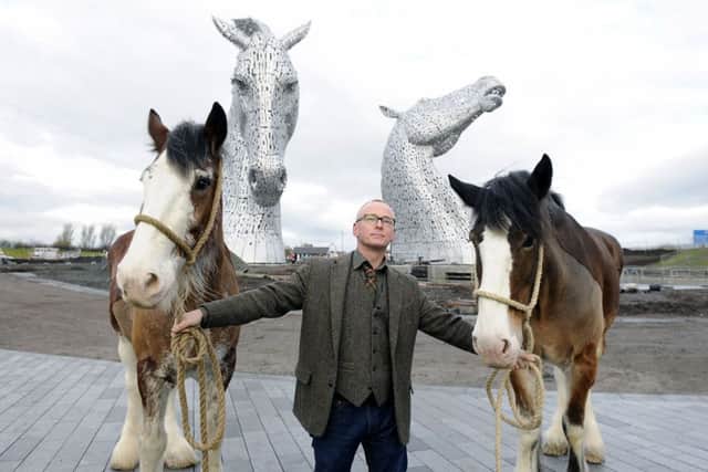 Sculptor Andy Scott with the Clydesdale horses, Duke and Baron, he modelled the Kelpies on. Picture: Michael Gillen