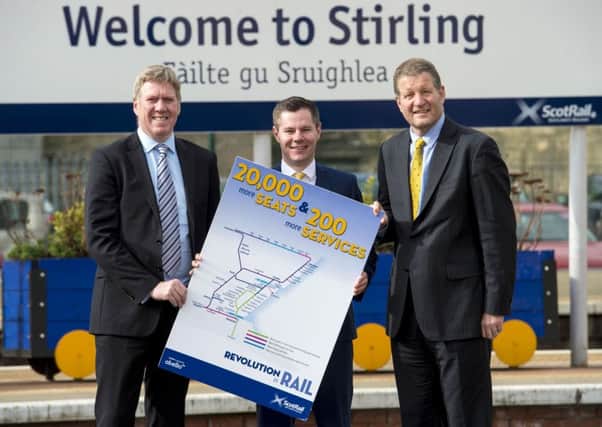 Transport Minister Derek Mackay (centre) and Abellio ScotRail MD Phil Verster announce the new rail services. Picture: PA