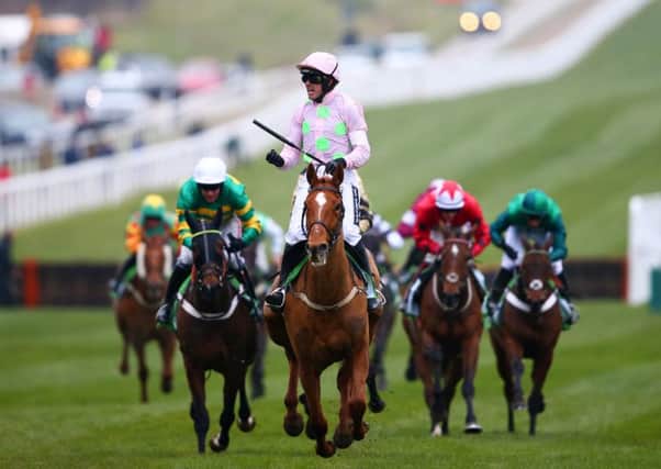 Ruby Walsh celebrates after riding Annie Power to an emphatic victory in the Champion Hurdle at Cheltenham. Picture: Getty