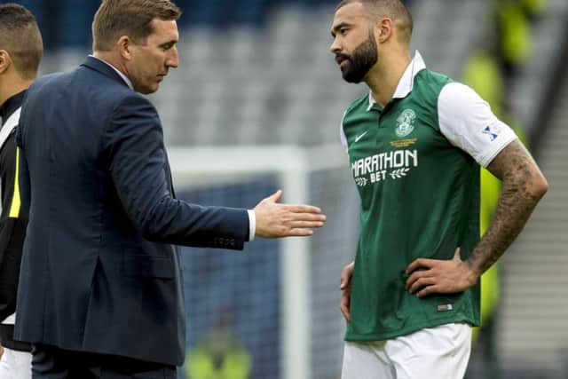 Hibs coach Alan Stubbs consoles Liam Fontaine after the League Cup final defeat by Ross County. Picture: Craig Williamson/SNS