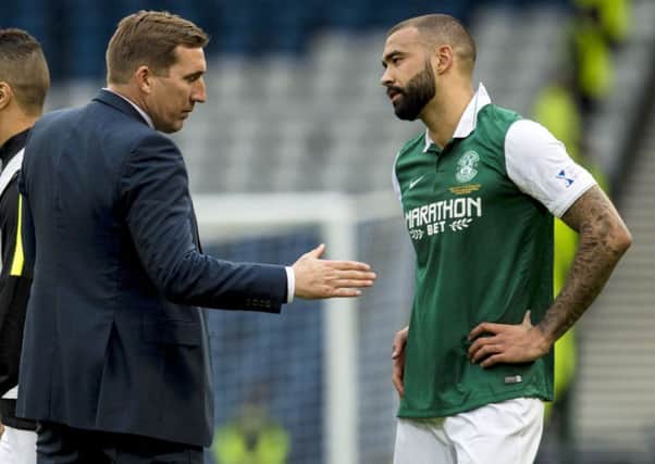 Hibs coach Alan Stubbs consoles Liam Fontaine after the League Cup final defeat by Ross County. Picture: Craig Williamson/SNS