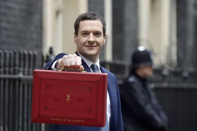 George Osborne outside 11 Downing Street before heading to the House of Commons to deliver his Budget. Picture: Hannah McKay/PA Wire