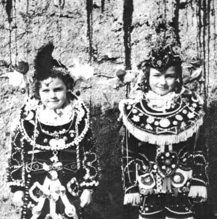 The costumes for the Festival of the Horse have become more elaborate over time. Originally, adornments were sewn onto a Sunday suit, with the decorations to be quickly removed in time for Church. PIC Orkney Library and Archive.