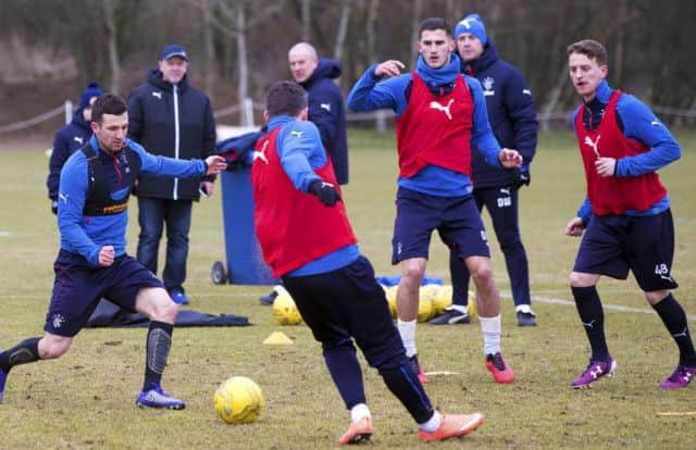 Rangers' Jason Holt, centre, challenges for the ball in training ahead of tonight's Championship clash with Falkirk. Picture: Rangers FC via Press Association