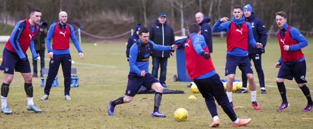 Rangers' Jason Holt, centre, challenges for the ball in training ahead of tonight's Championship clash with Falkirk. Picture: Rangers FC via Press Association