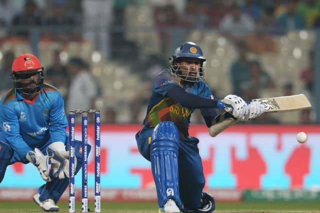 Sri Lanka's Tillakaratne Dilshan plays a shot against Afghanistan at Eden Gardens in Kolkata. Picture: Dibyangshu Sarkar/AFP/Getty