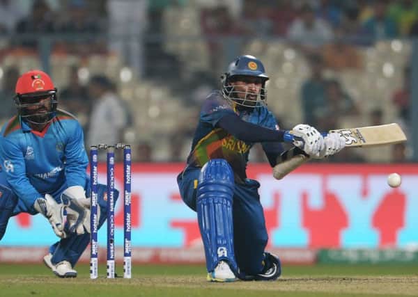 Sri Lanka's Tillakaratne Dilshan plays a shot against Afghanistan at Eden Gardens in Kolkata. Picture: Dibyangshu Sarkar/AFP/Getty