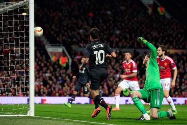 Liverpools Philippe Coutinho scores his sides goal at Old Trafford with a delicate chipped finish. Picture: AP