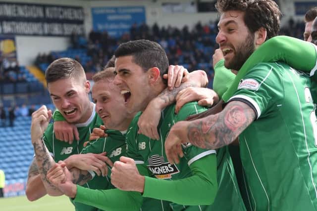 Celtic's Tom Rogic (2nd right) celebrates his excellent winning goal at the weekend. Picture: SNS